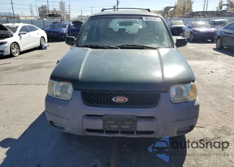 2002 Ford Escape Xls z USA, uszkodzony, nr VIN 1FMYU01182KD01293